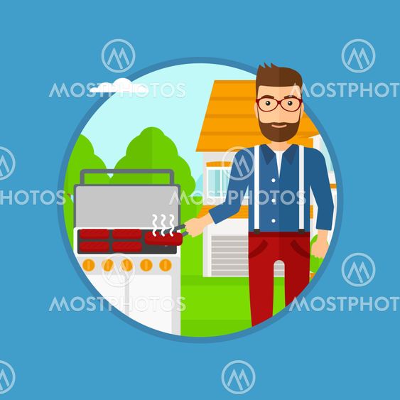 Man cooking meat on gas barbecue grill.