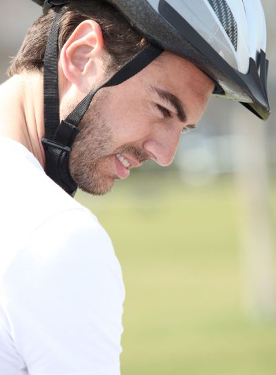 a man wearing a bike helmet