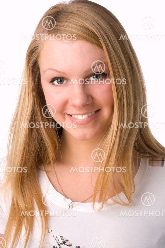 A smiling blonde on white background in studio.
