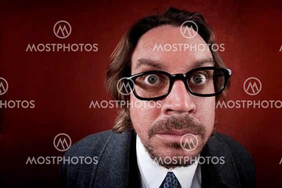 Puzzled Man with Glasses