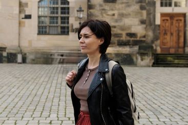 Tourist Girl Exploring Historical European City Area