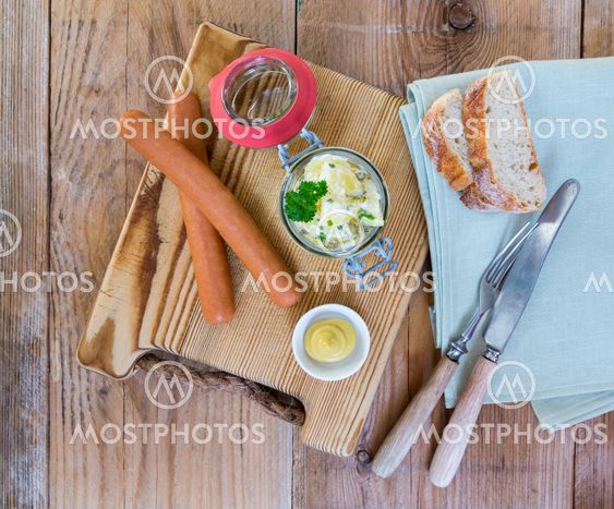 Sausages with mustard and potato salad