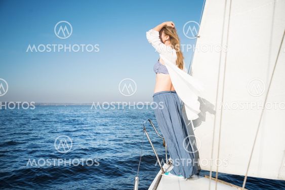 woman staying on sailboat