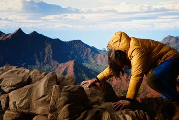 Foolish hiker tripping and losing balance on the rocky...