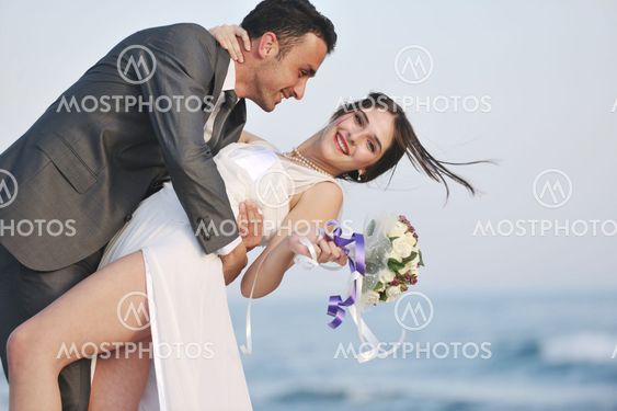 romantic beach wedding at sunset