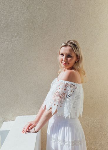 woman in summer dress smiling