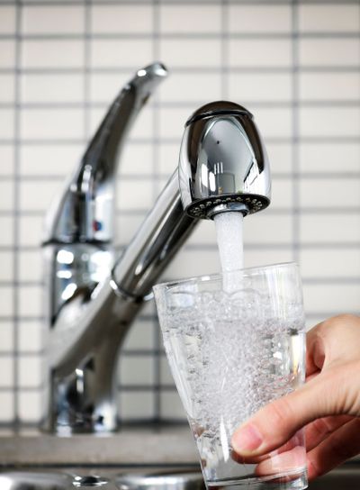 Filling glass of tap water