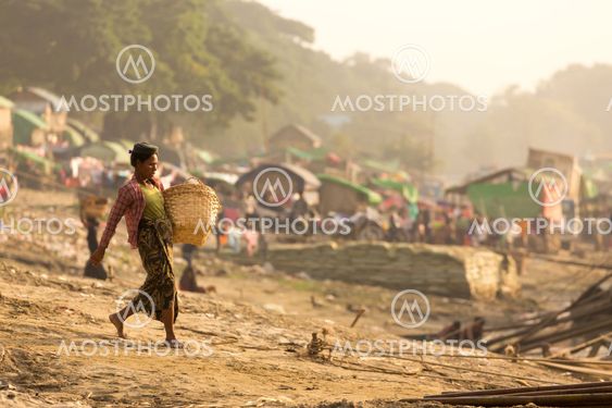 Burmese woman working in slum