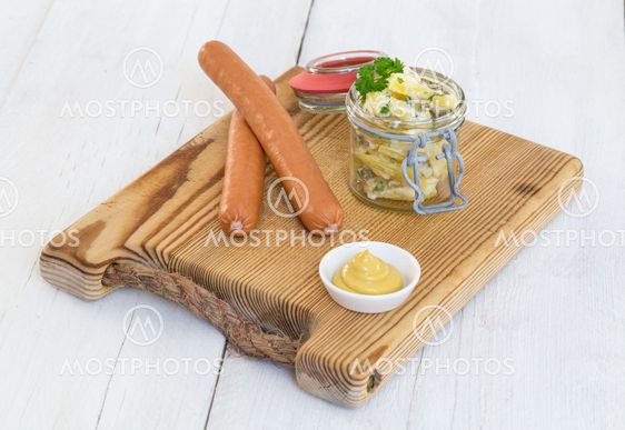 Sausages with mustard and potato salad