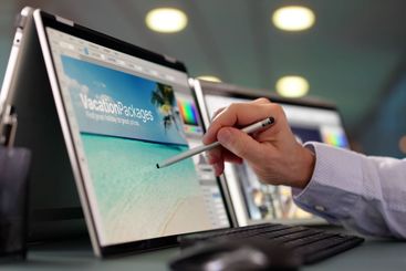 Male Designer Working On Computer