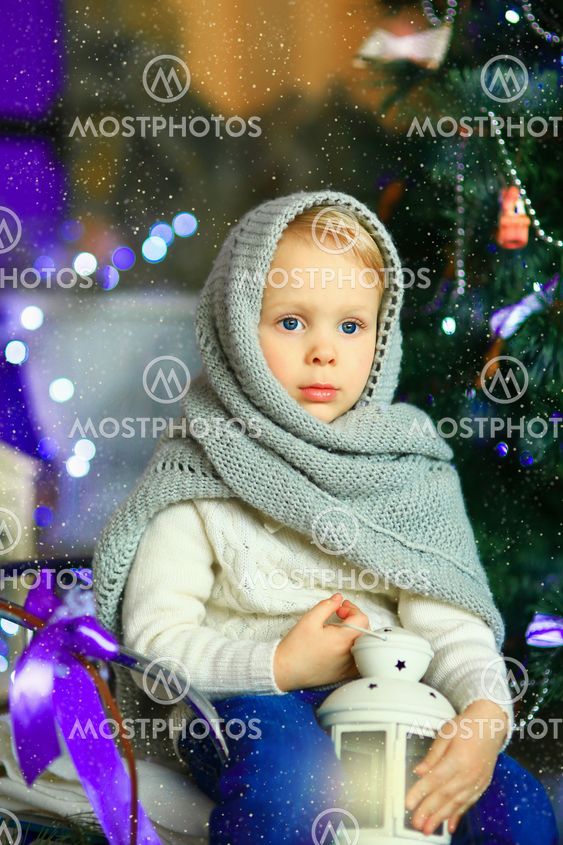 the girl near a Christmas fir-tree 11
