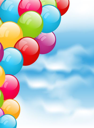 Flying colourful balloons in blue sky