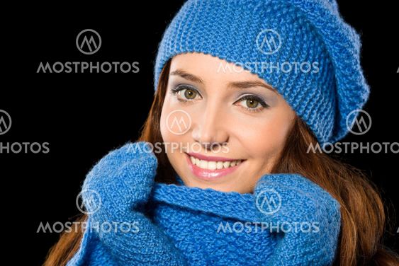 Young happy woman wearing winter cloth