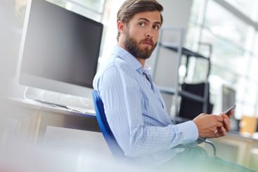 Man, thinking and professional with phone in office,...