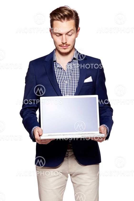 Businessman holding his laptop