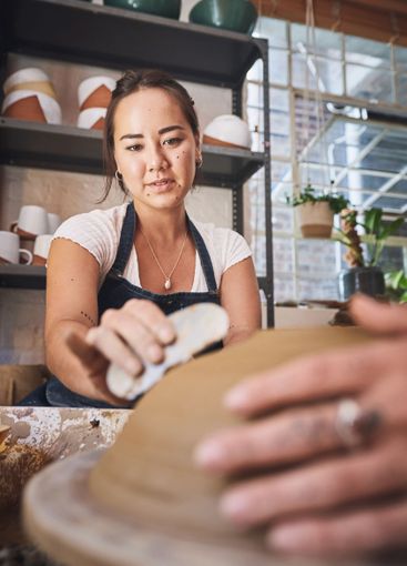 People, tool and pottery class in studio, working...