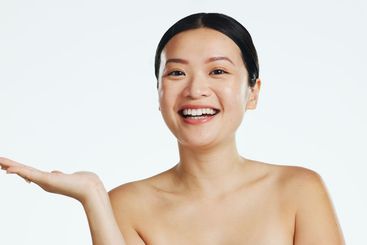 Asian woman, face and advertising space for beauty on...