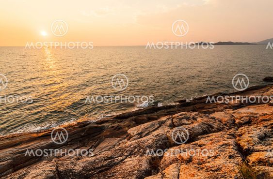 Before beatiful sunrise on the rocks, Rayong, Thailand.
