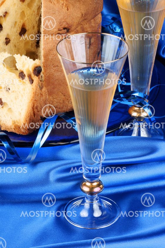 Italian Christmas composition with panettone and spumante