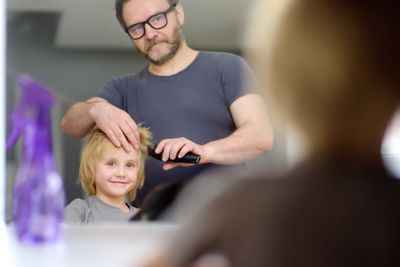 Preschooler boy gets haircut at home during quarantine....