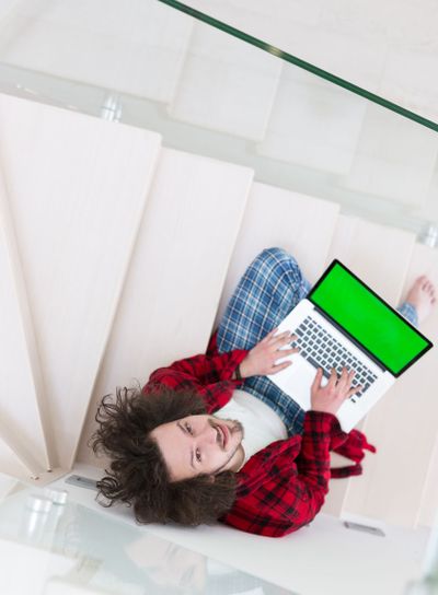 freelancer in bathrobe working from home