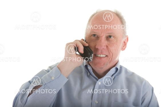 Older Man in Blue Shirt on Cell Phone