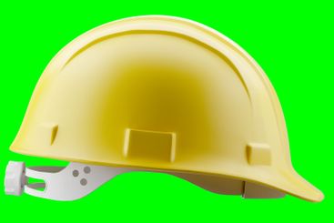 Yellow Construction Hard Hat Isolated on a Green Screen.