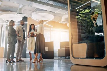 Lobby, talking and business people in office for...