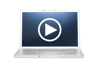 Laptop with play symbol