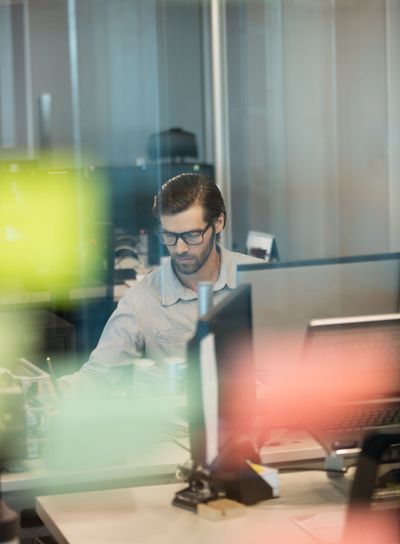 Concentrated businessman working at office