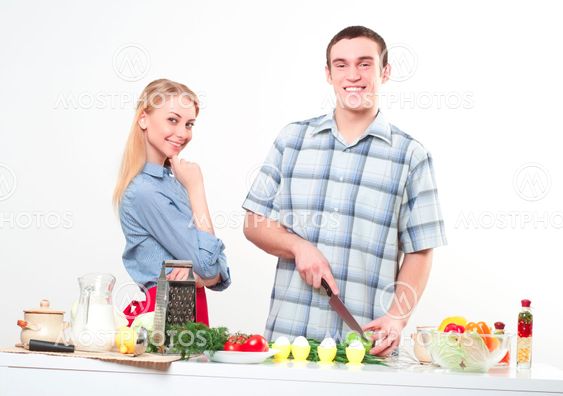 couple of cooking together
