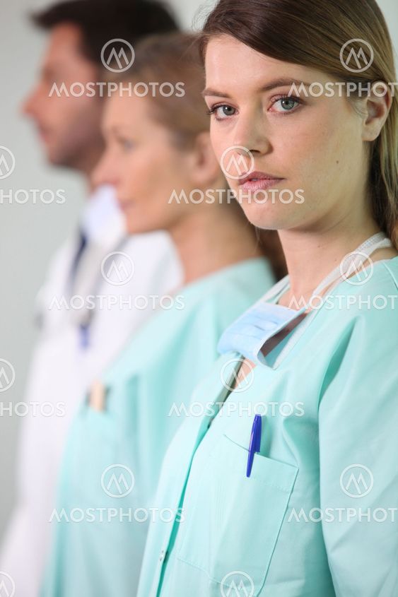 Young nurse and medical team