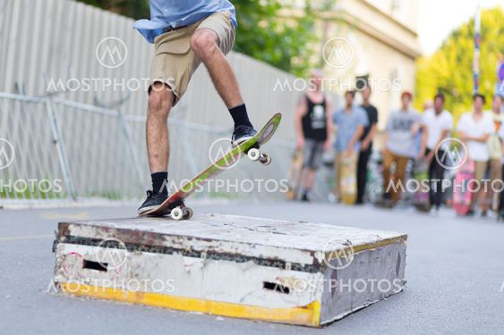 Boys skateboarding on street. Urban life.