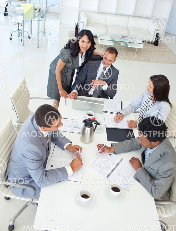 Multi-ethnic businessteam working in a project in a meeting