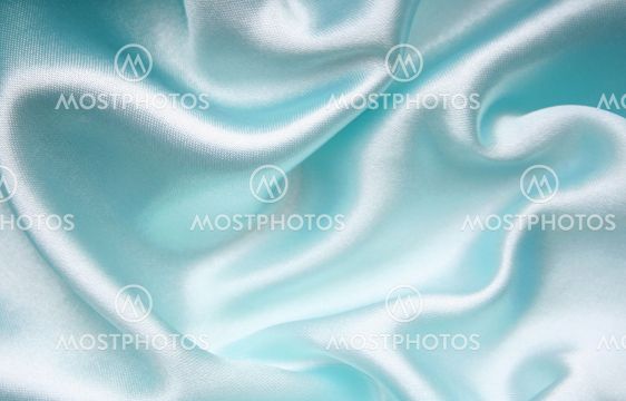 Smooth elegant blue silk as background