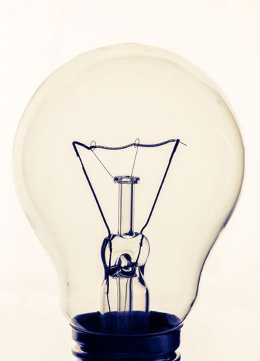Lightbulb on white background, close up shot
