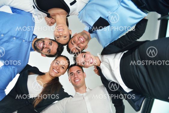 business people with their heads together