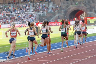 Rear view of running athletes in the 1500m Women...
