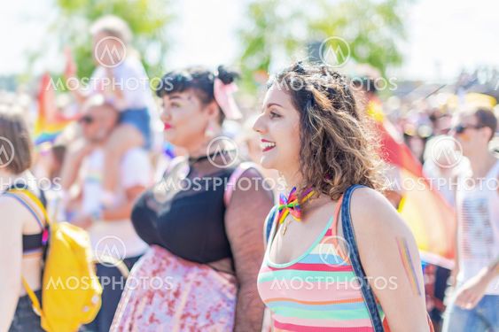 Happy colorful woman during the pride parade in Stockholm