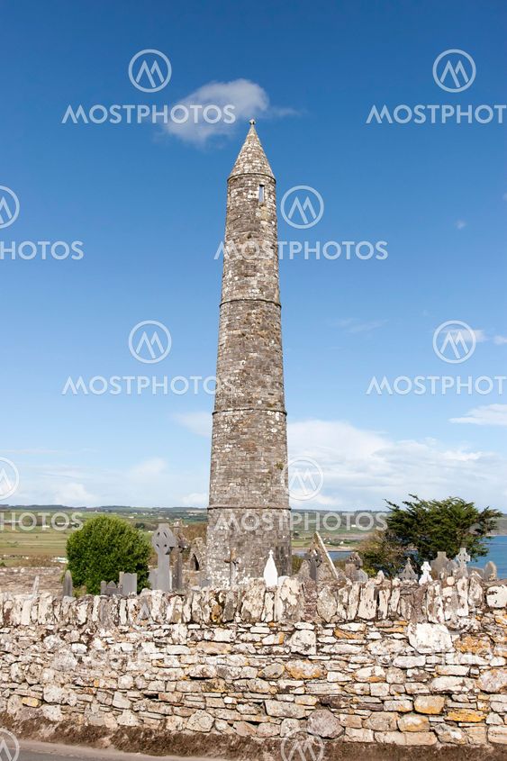 Ardmore round tower and celtic graveyard wall