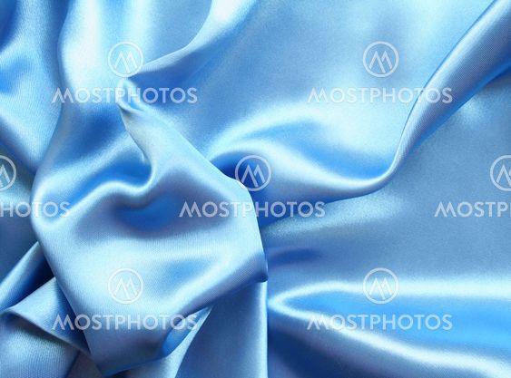 Smooth elegant blue silk as background