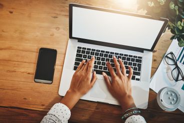 Above, business and woman with laptop, hands and typing...