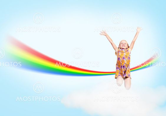girl jumping on clouds and a rainbow