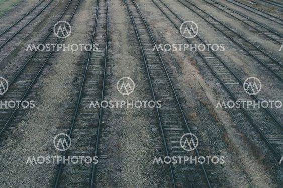Old railroad tracks at train station, transportation infrastructure