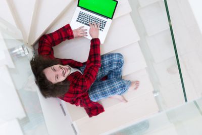 freelancer in bathrobe working from home