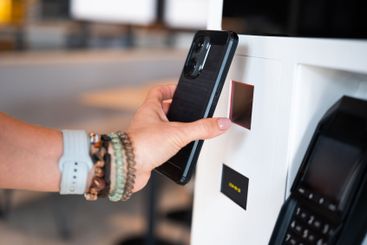 Girl Scanning Qr Code In Self-Service Terminal
