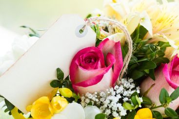 Beautiful bouquet with pink roses and yellow accents...