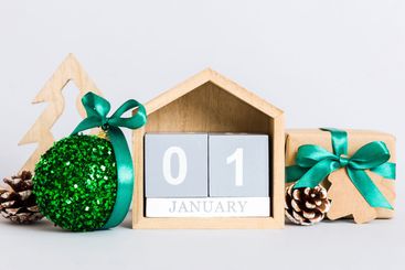 1 january. Christmas composition on colored background...