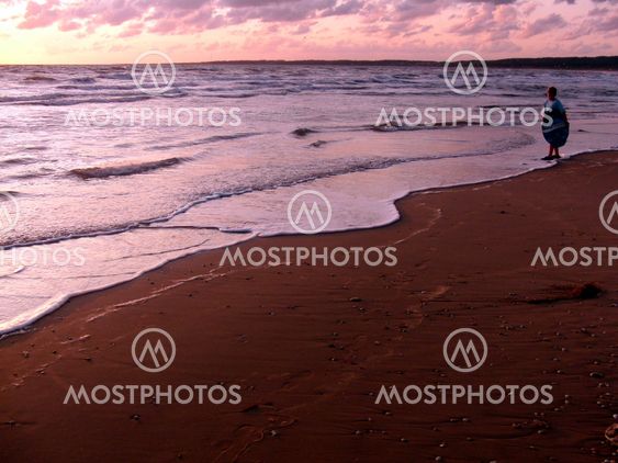 Skimboarding in the sunset