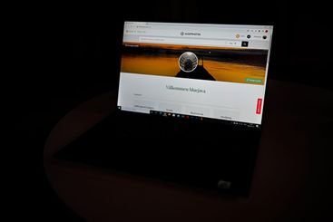 Dator med Mostphotos öppet